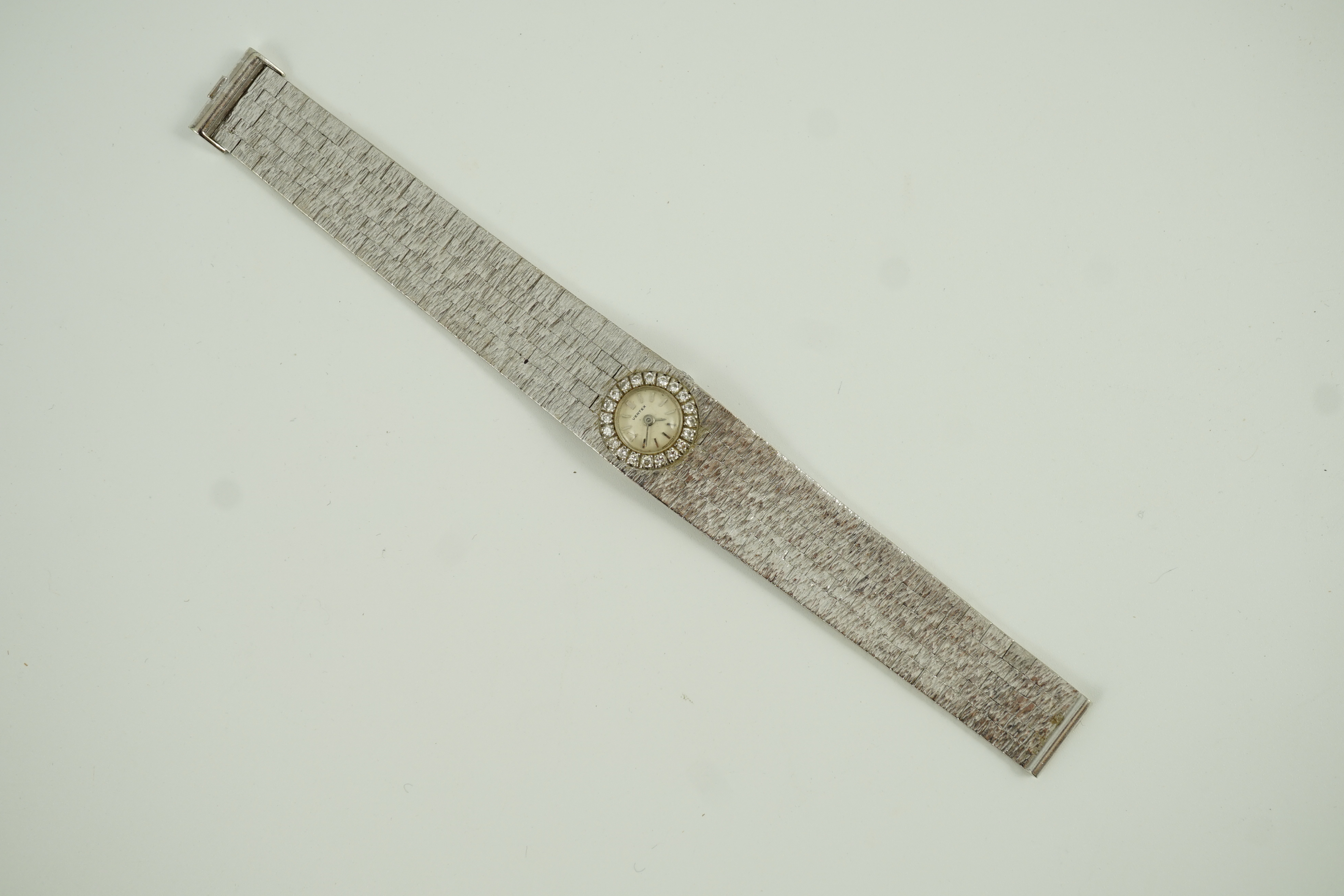 A lady's 1960's 18ct white gold and diamond set Vertex manual wind bracelet watch